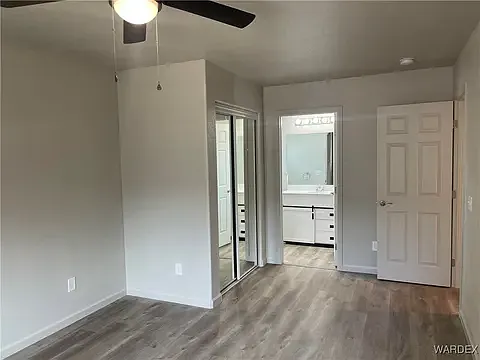 Spacious and bright primary bedroom suite at the Arditto residence