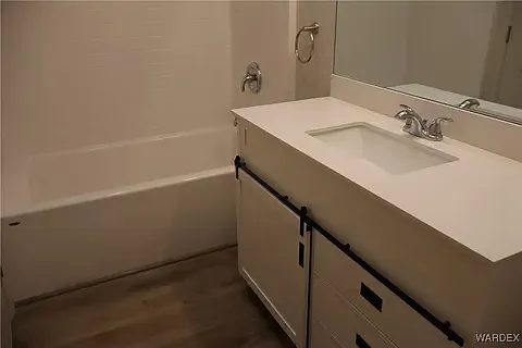 Clean and modern guest bathroom design at the Arditto residence